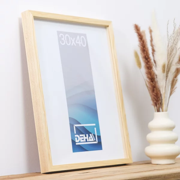 Cadre à rehausse en bois Bunda 70x90 cm | frêne naturel glacé | verre standard (2 mm)